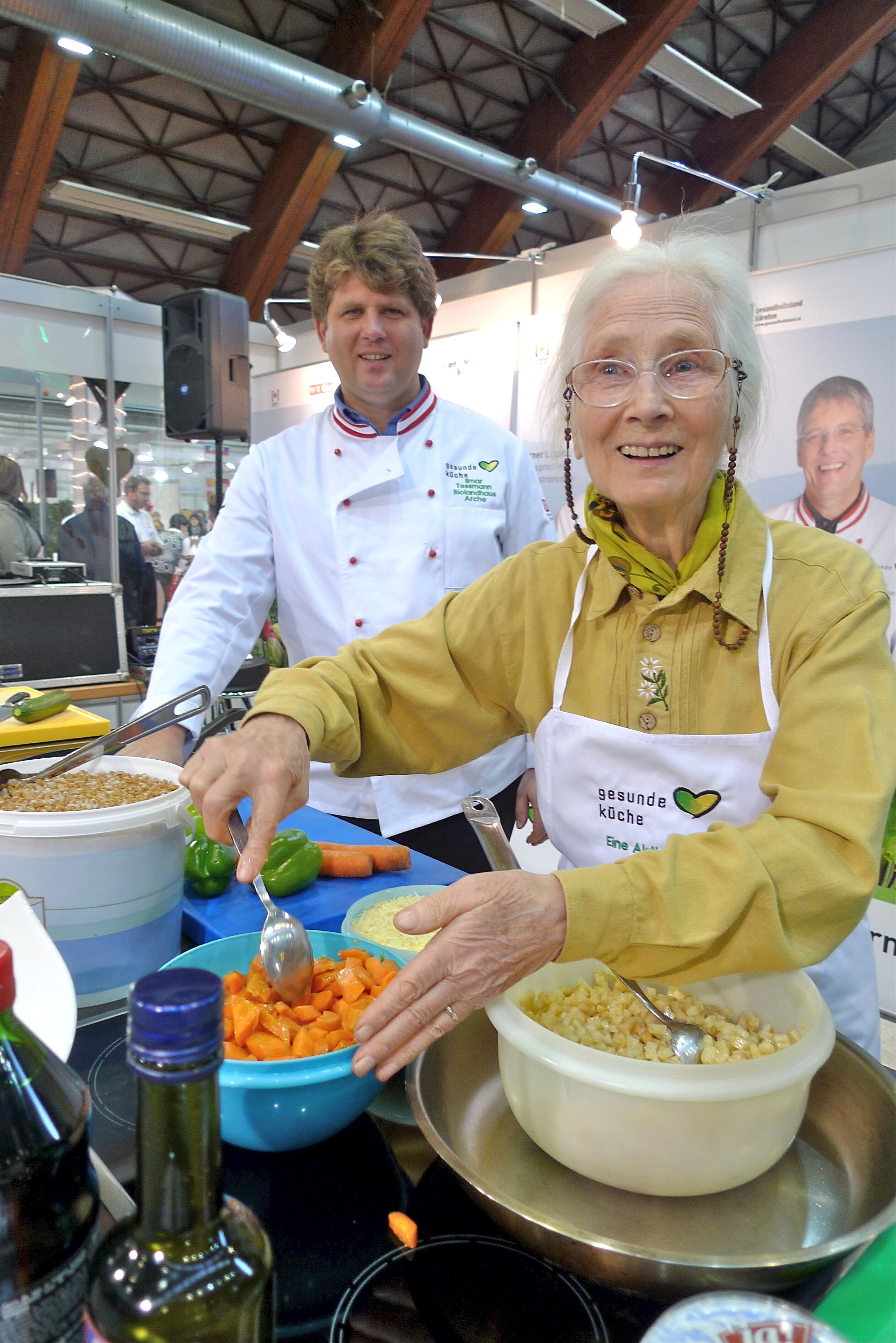 A person preparing food with a bowl and a spoon.