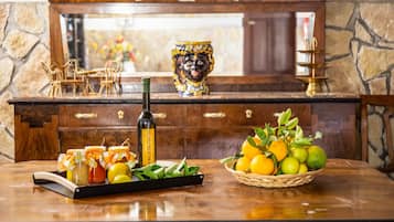 Family Apartment, 1 Bedroom, Courtyard View | In-room dining