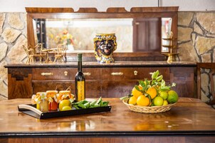 Family Apartment, 1 Bedroom, Courtyard View | In-room dining