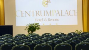 A presentation screen with the text "CENTRUMPALACE Hotel & Resorts" and a logo. - Centrum Palace (Campobasso)