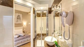 Shower, free toiletries, hair dryer, slippers