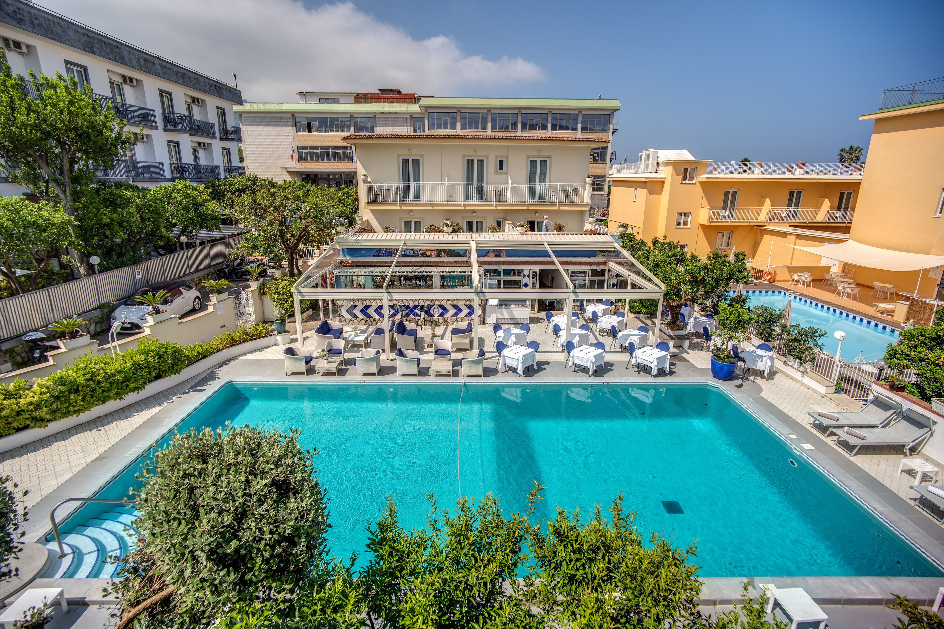 Outdoor pool, open 9:00 AM to 6:30 PM, pool umbrellas, pool loungers