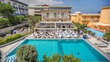 Outdoor pool, open 9:00 AM to 6:30 PM, pool umbrellas, sun loungers