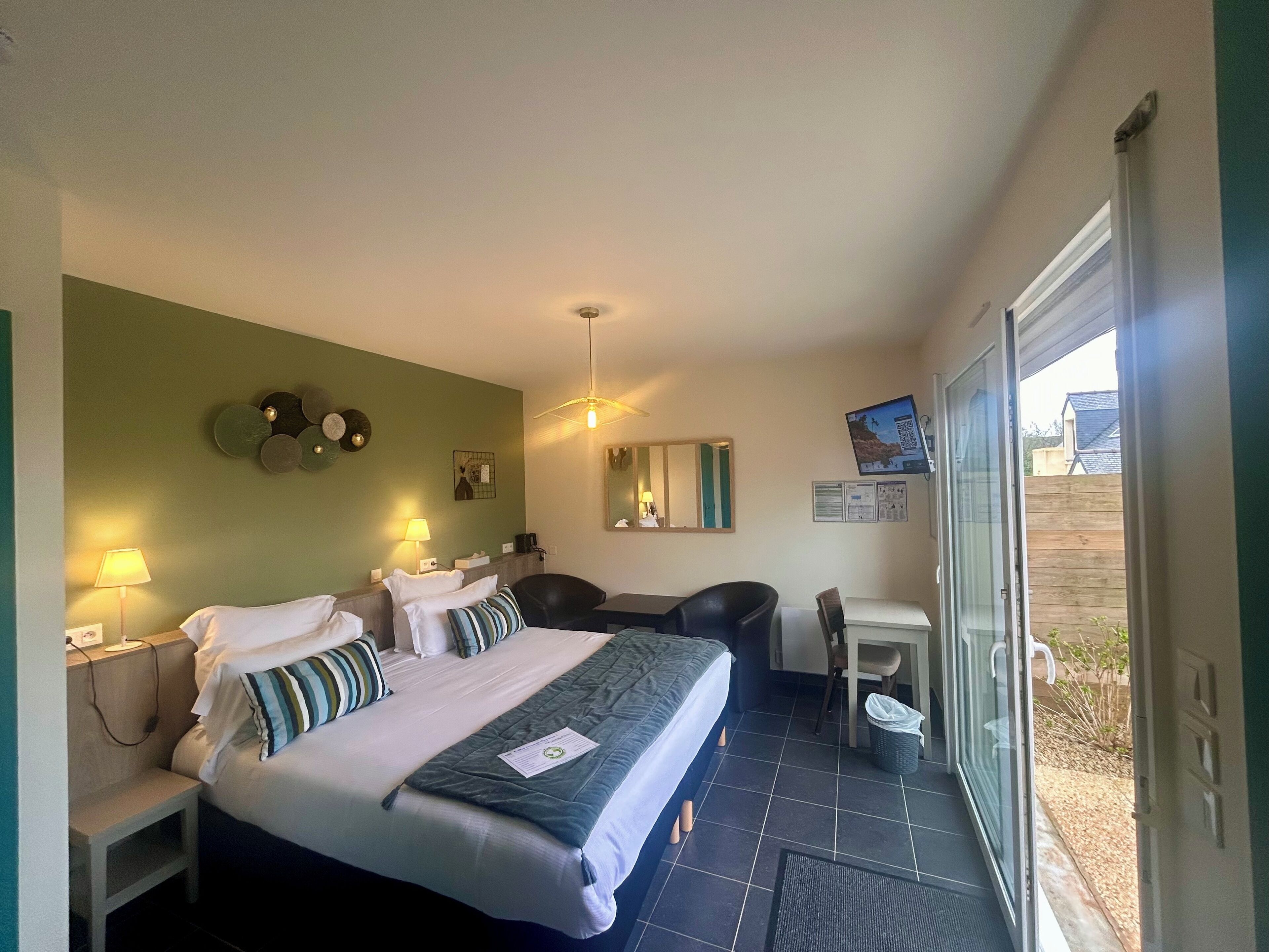 Deluxe Triple Room, 1 Bedroom, Courtyard Area | Premium bedding, Select Comfort beds, soundproofing, iron/ironing board