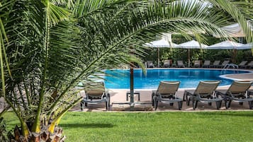 Outdoor pool, open 10:00 AM to 7:00 PM, pool umbrellas, pool loungers