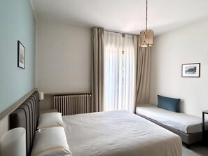 Premium bedding, down duvets, in-room safe, desk