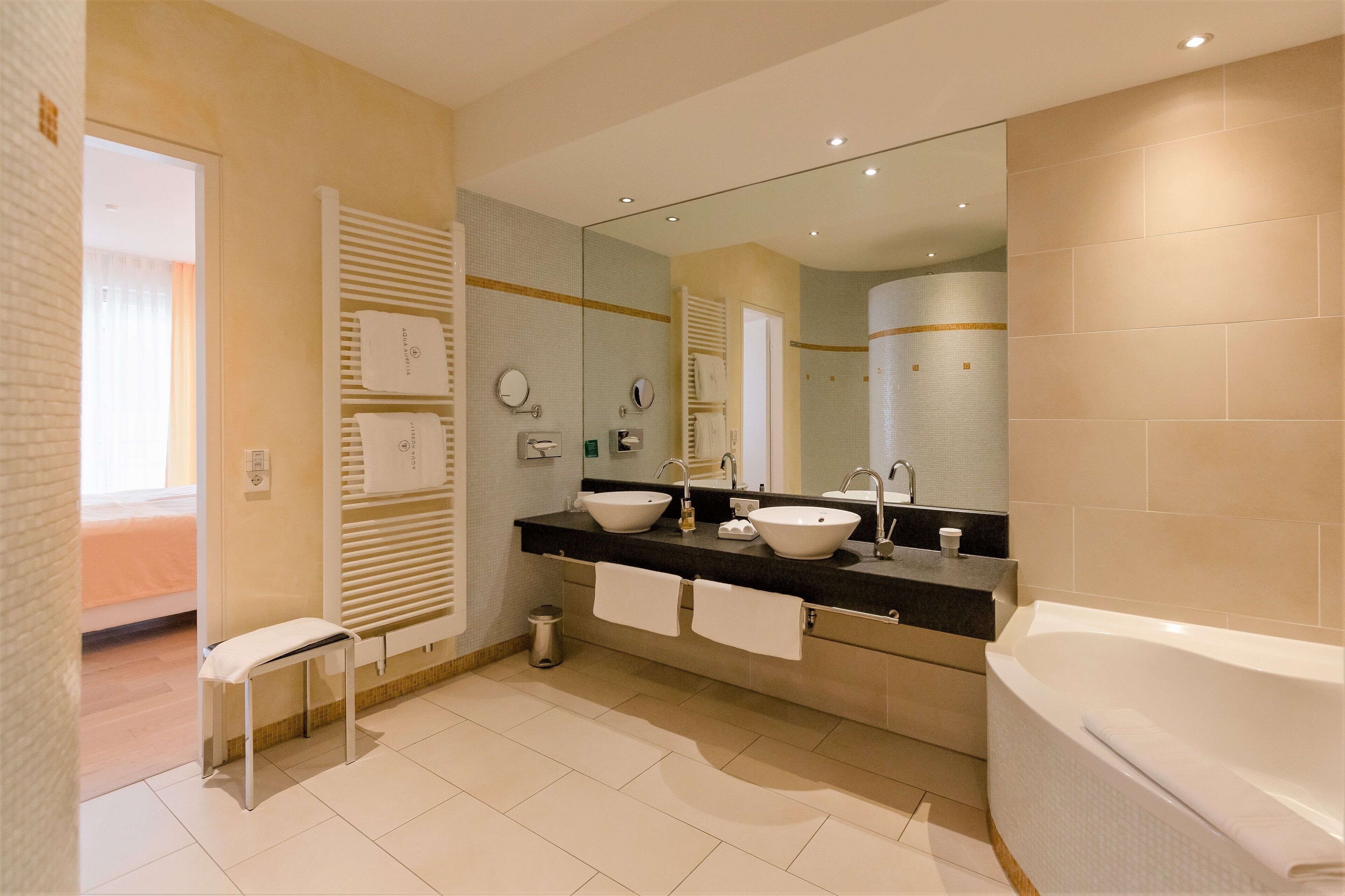 grand suite, park view | bathroom | shower, designer toiletries, hair dryer, bathrobes