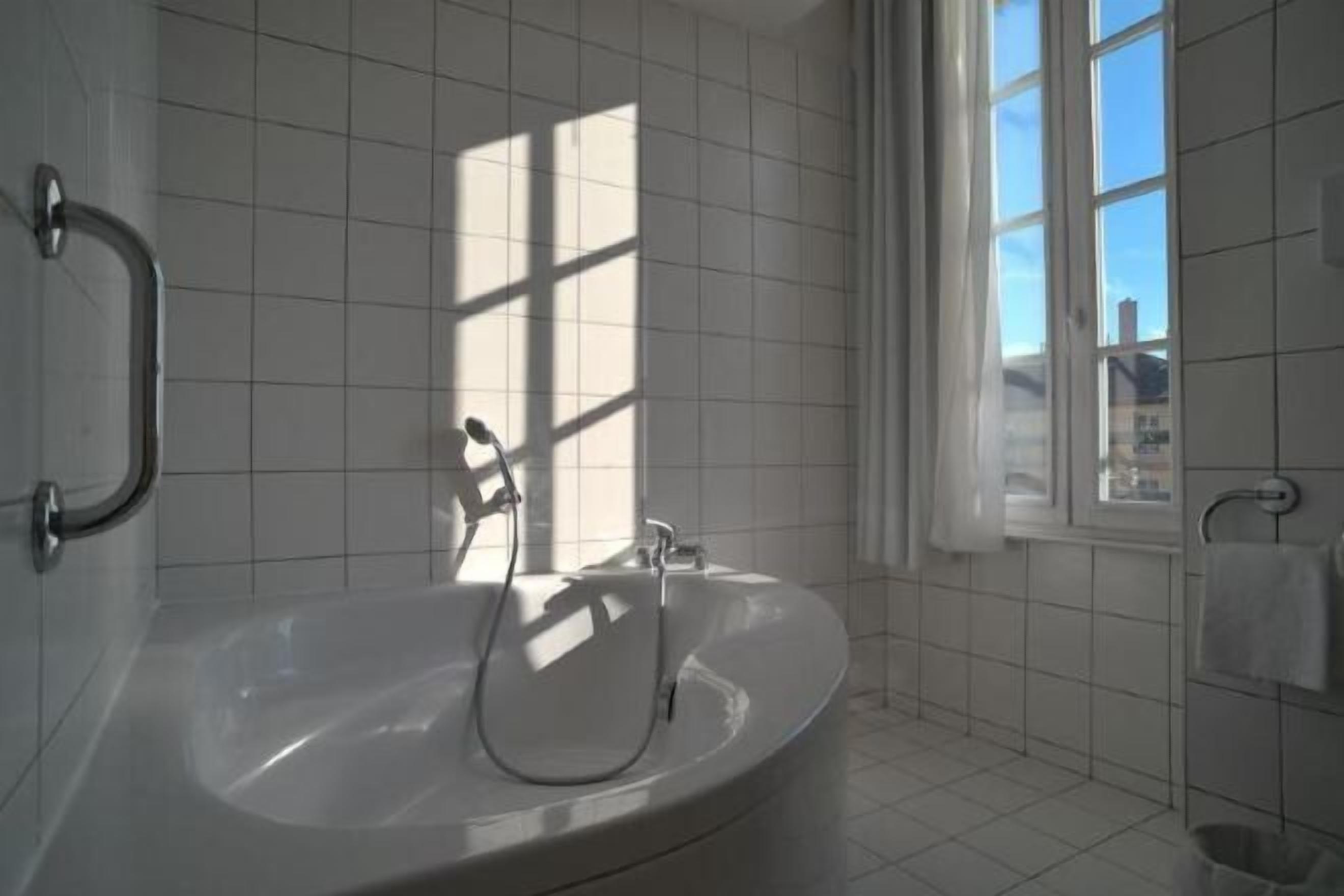 Bathroom | Eco-friendly toiletries, hair dryer, towels