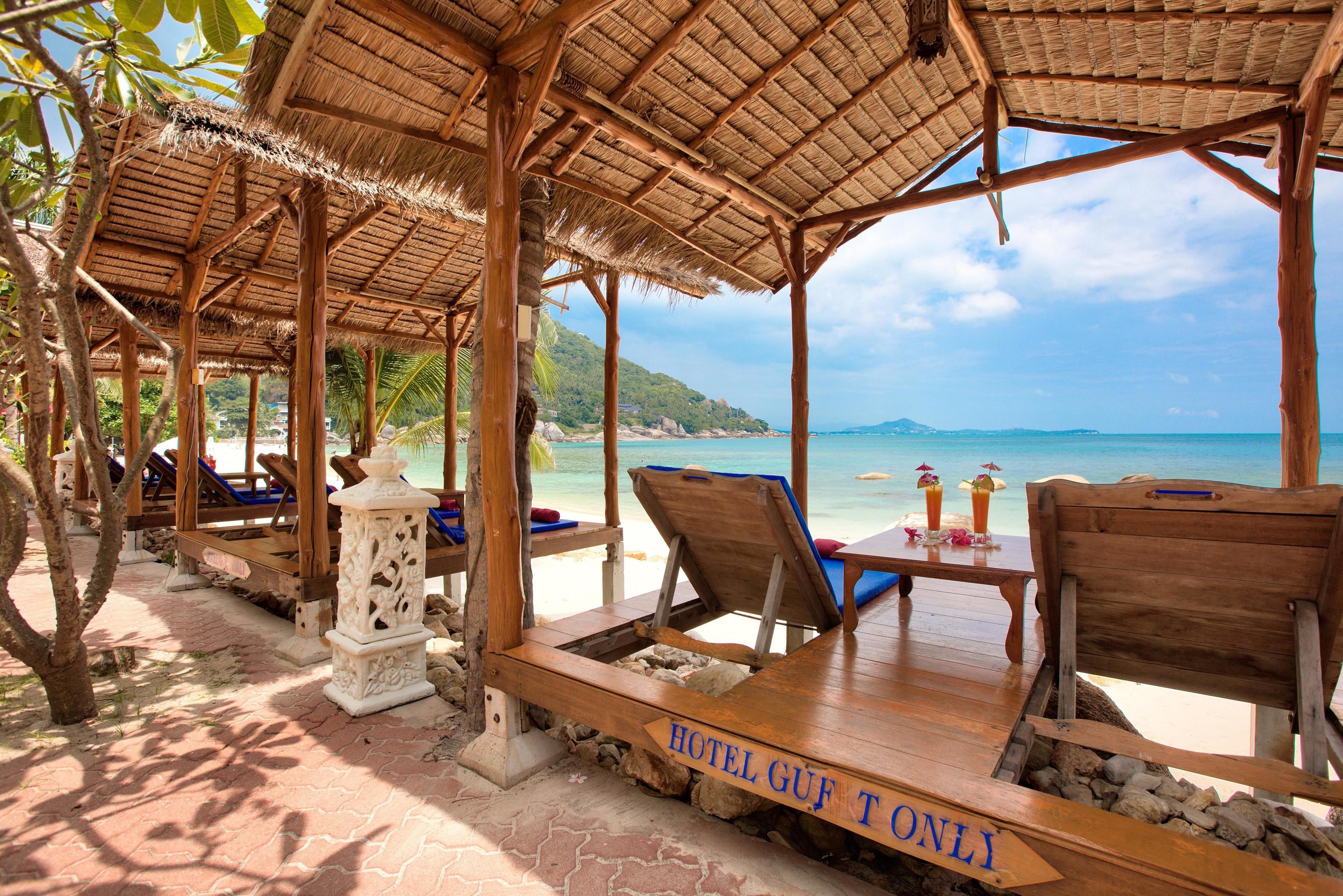 On the beach, free beach cabanas, beach towels, beach massages