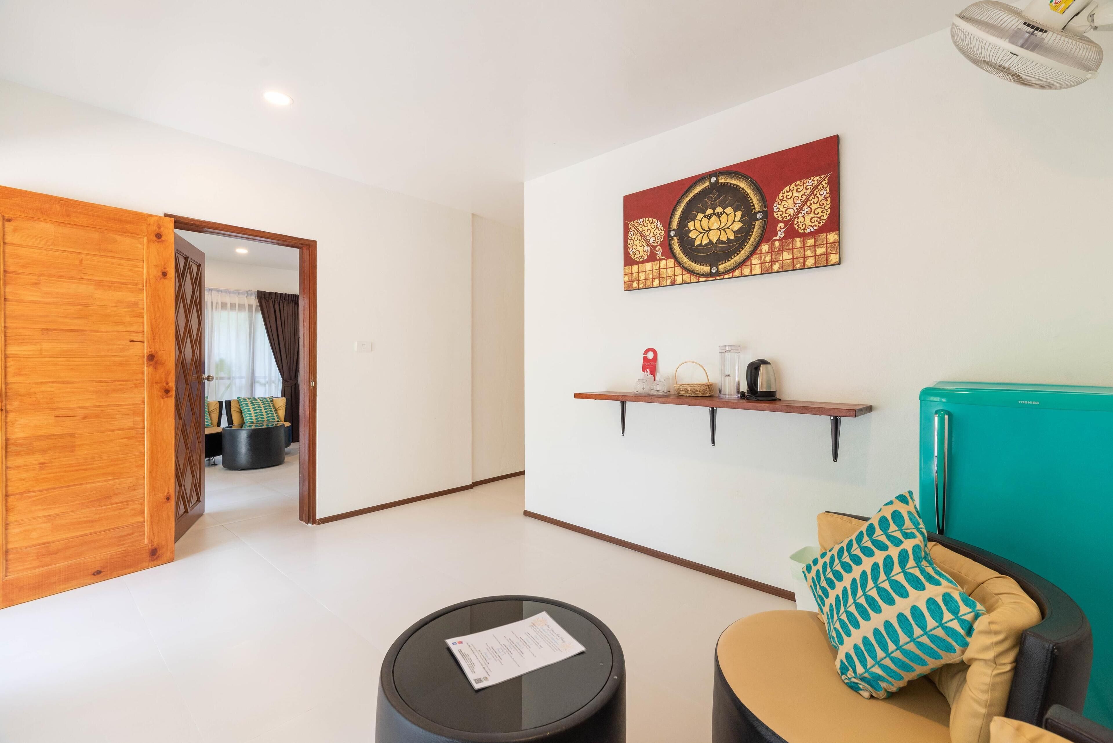 superior villa, 2 bedrooms, connecting rooms | living room | 32-inch tv with cable channels