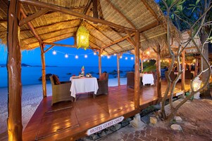 Breakfast, lunch, dinner served; Modern European cuisine, beach views 