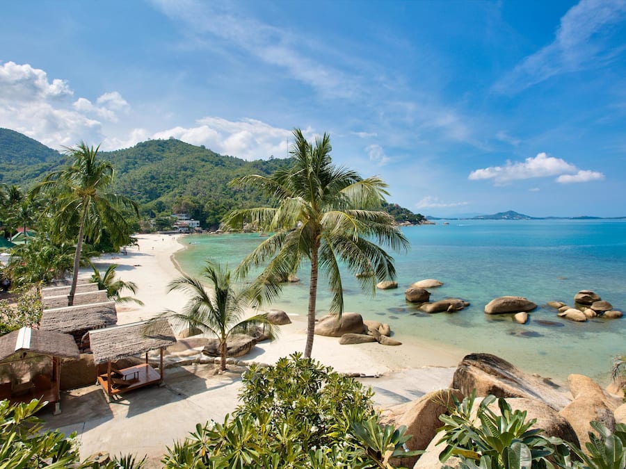 Aan het strand, gratis strandcabana's, strandlakens