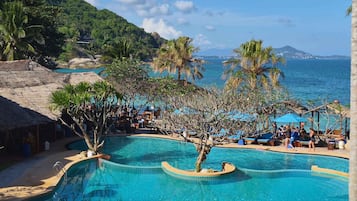 Outdoor pool, open 7:00 AM to 6:00 PM, pool umbrellas, sun loungers