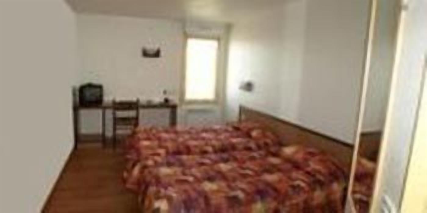 Standard Twin Room | Desk, blackout drapes, iron/ironing board, free cribs/infant beds