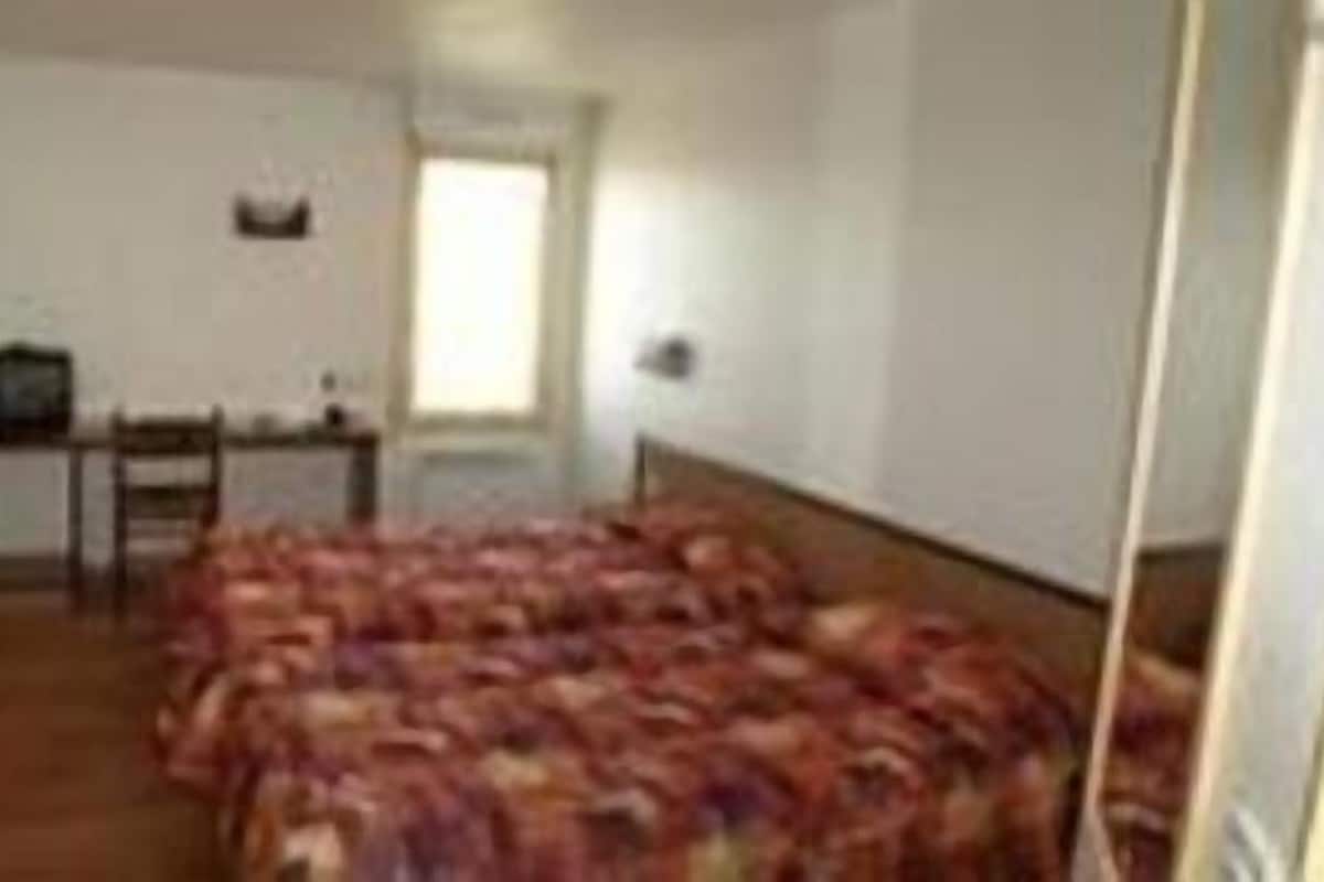 Standard Twin Room | Desk, blackout drapes, iron/ironing board, free cribs/infant beds