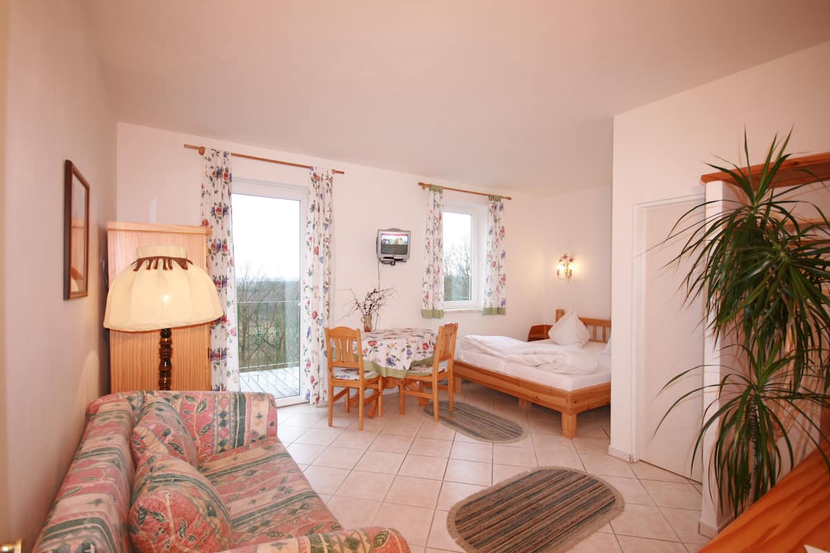 single room | living area | lcd tv