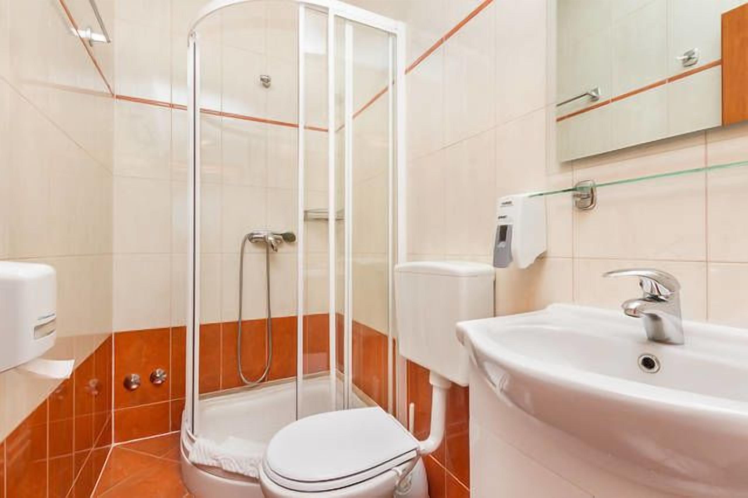 economy double or twin room | bathroom | free toiletries, hair dryer, towels