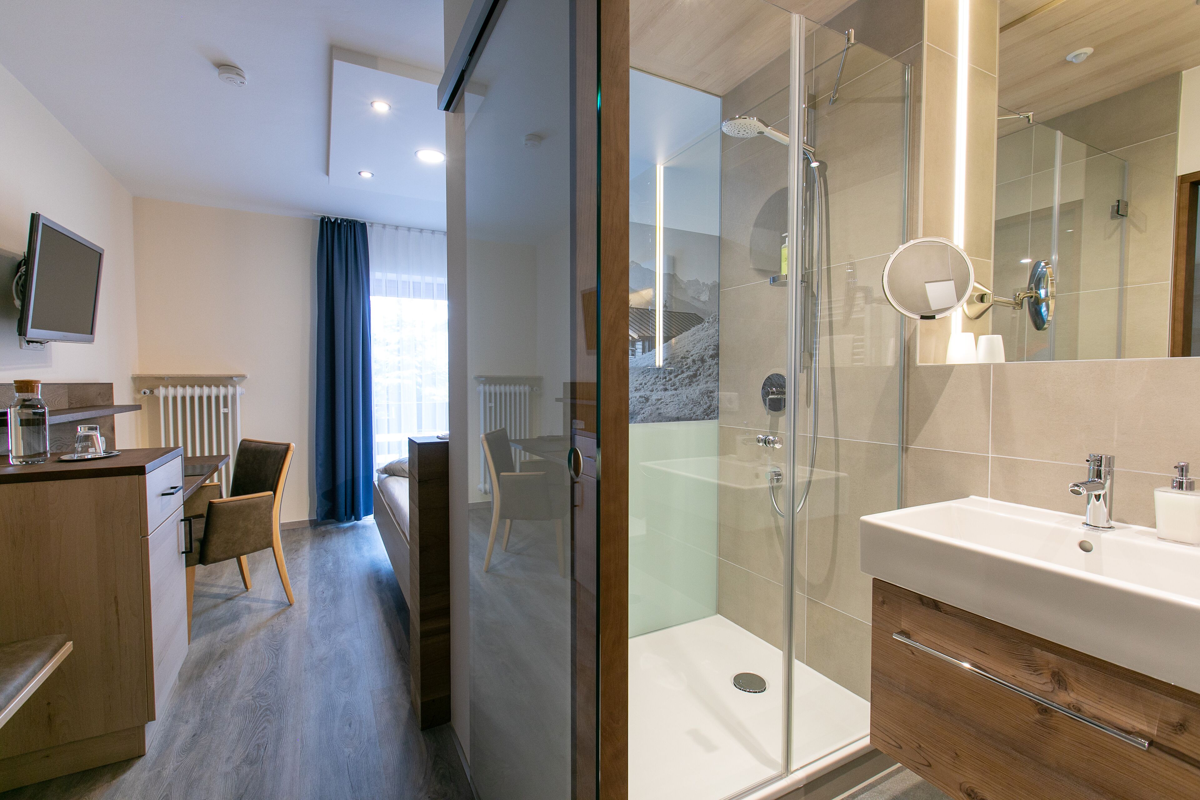 traditional single room | bathroom | shower, hair dryer, towels, soap