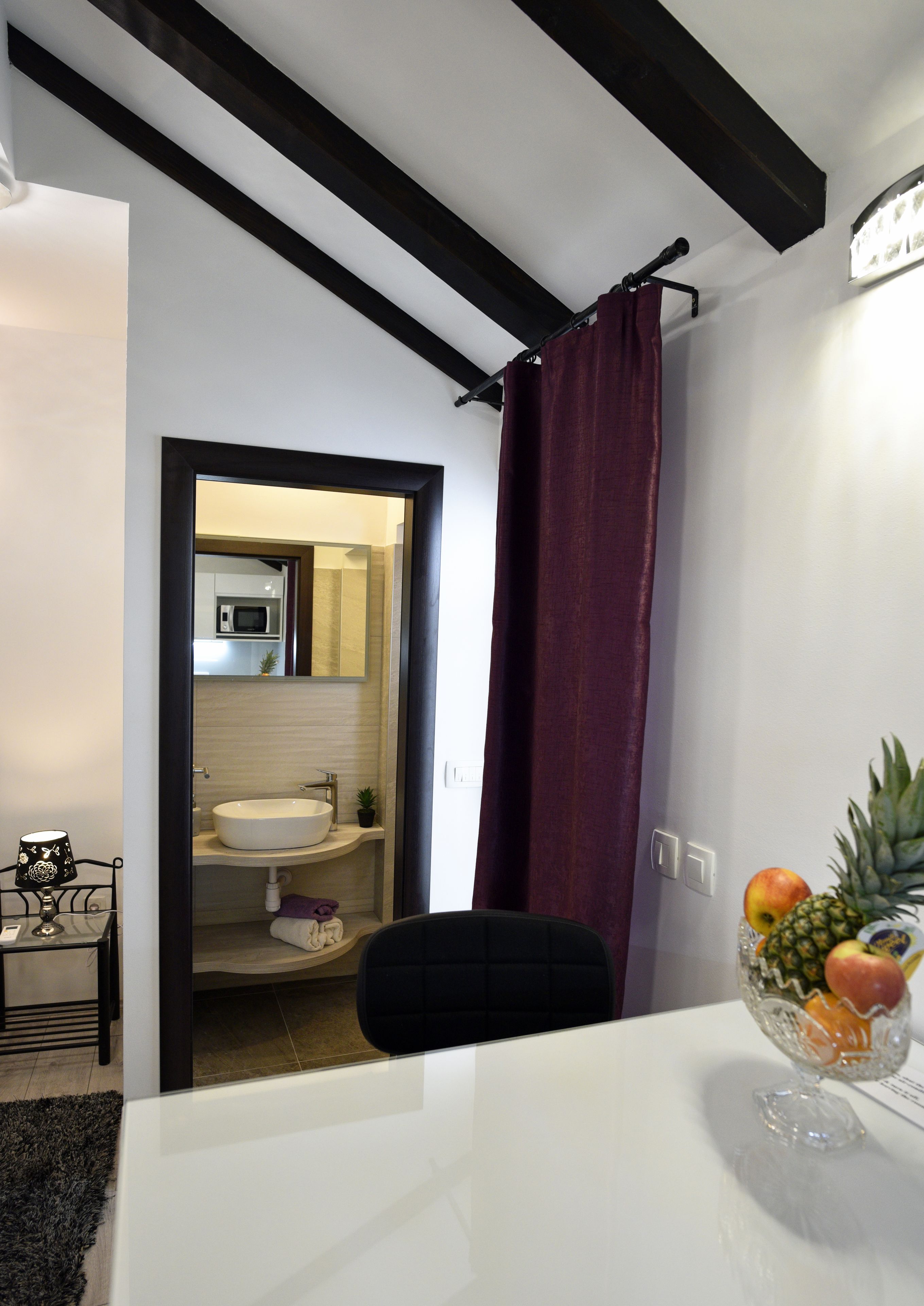 Desk, laptop workspace, blackout curtains, iron/ironing board