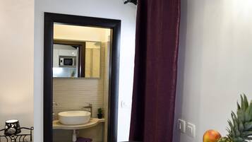 Desk, laptop workspace, blackout curtains, iron/ironing board