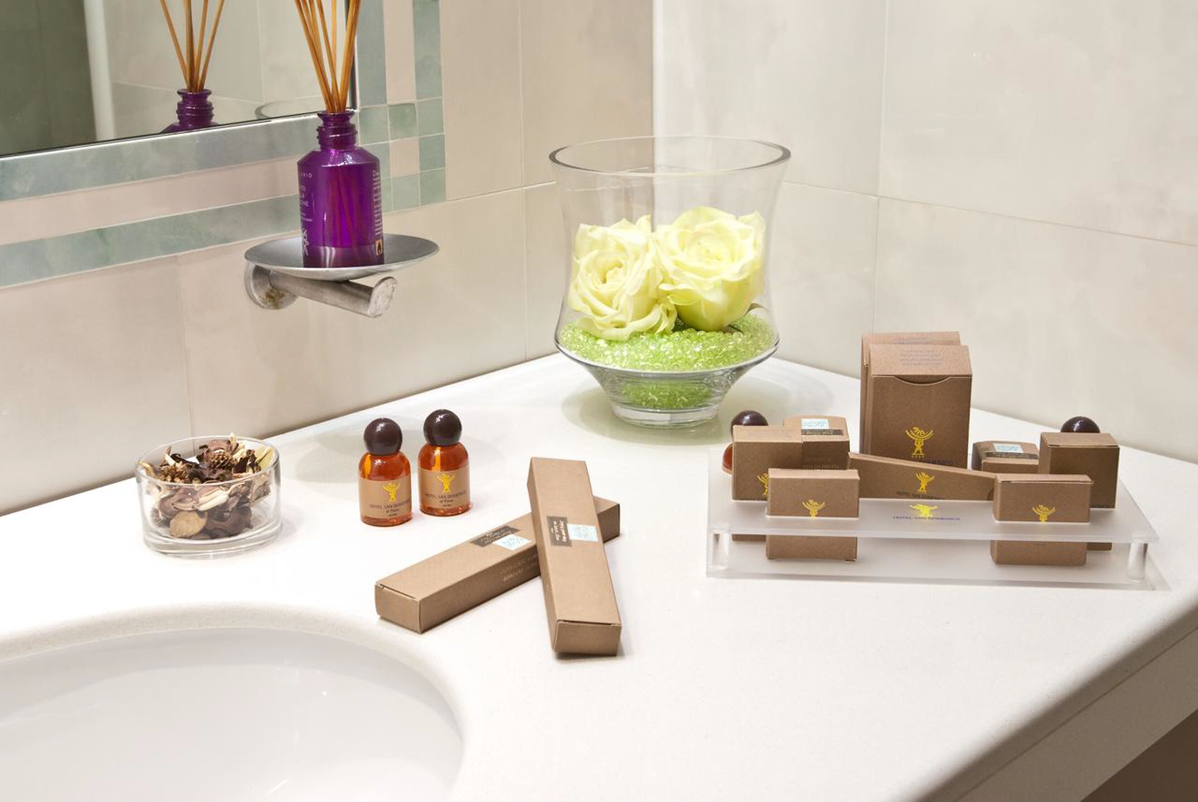 hair dryer, slippers, bidet, towels