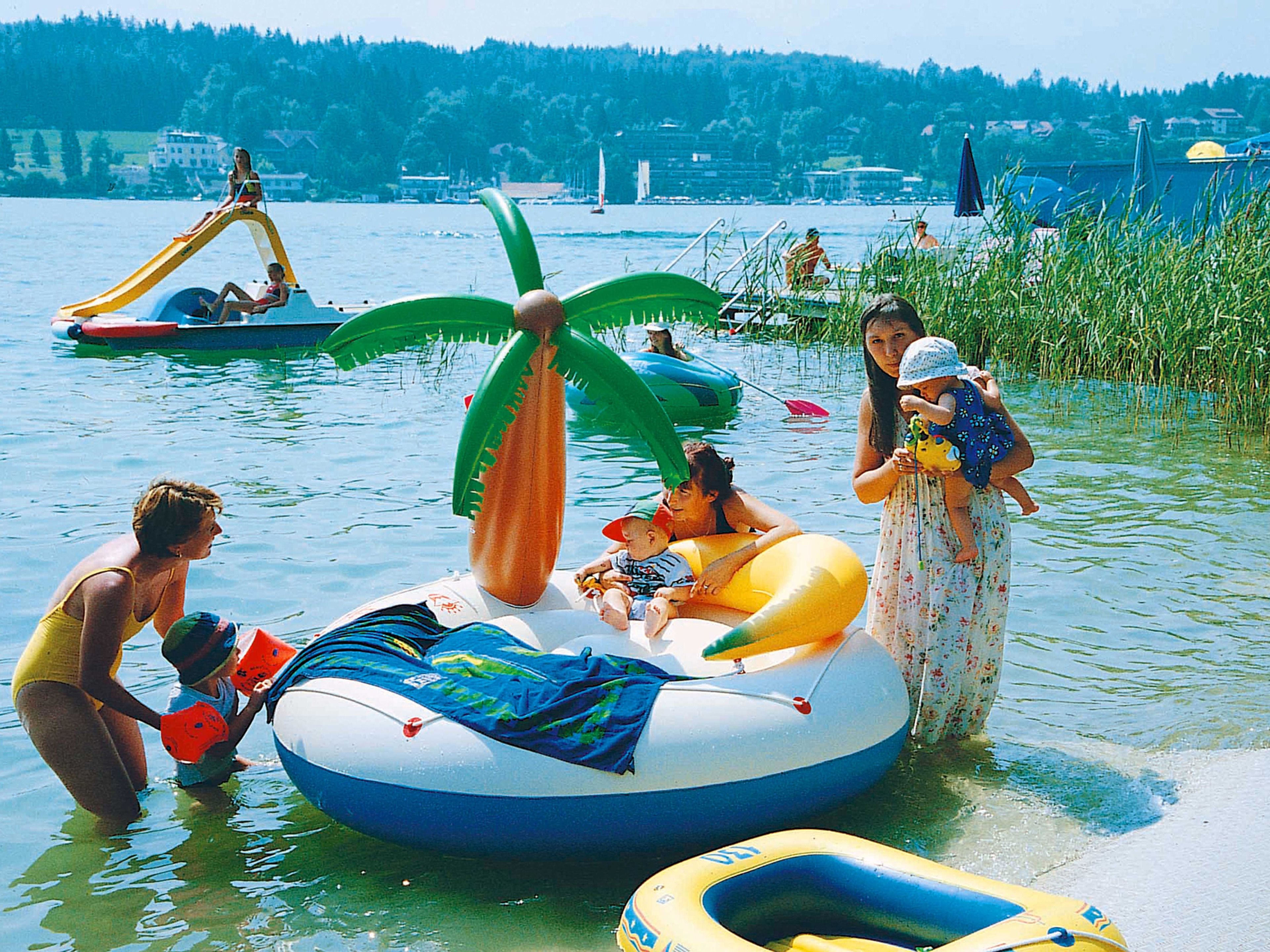 private beach, black sand, free beach cabanas, sun-loungers