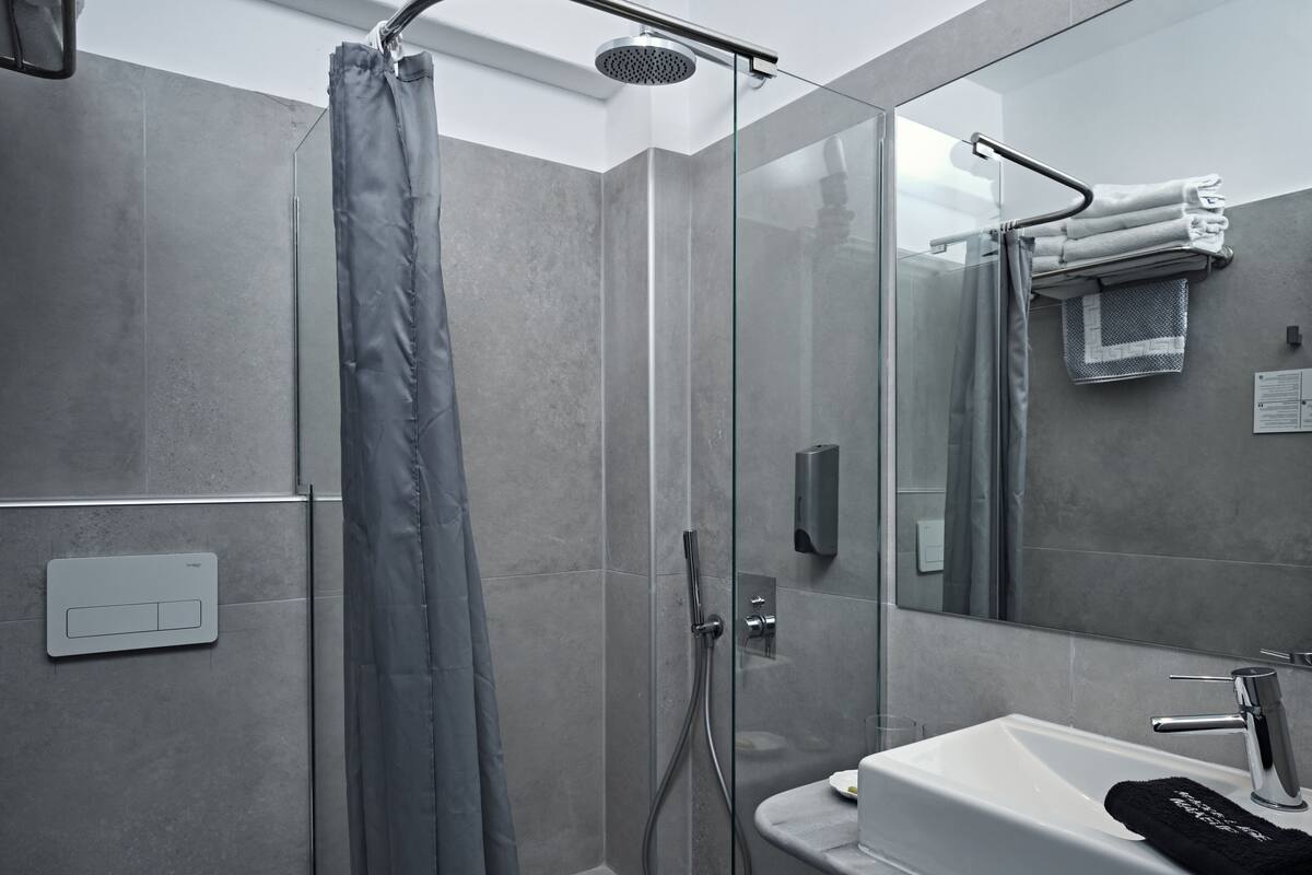 shower, eco-friendly toiletries, hair dryer, bathrobes