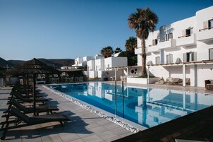Seasonal outdoor pool, pool umbrellas, pool loungers