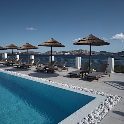 Seasonal outdoor pool, pool umbrellas, sun loungers