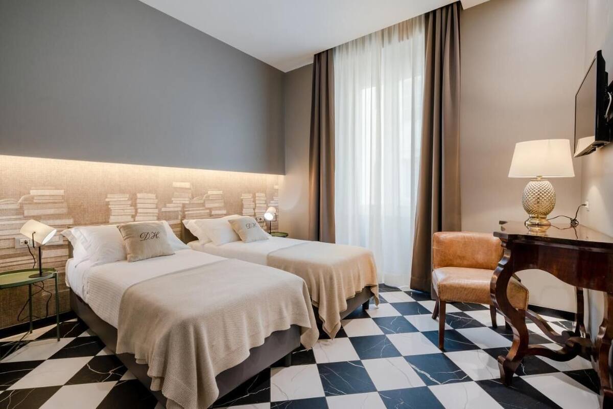 Premium bedding, down comforters, memory foam beds, minibar