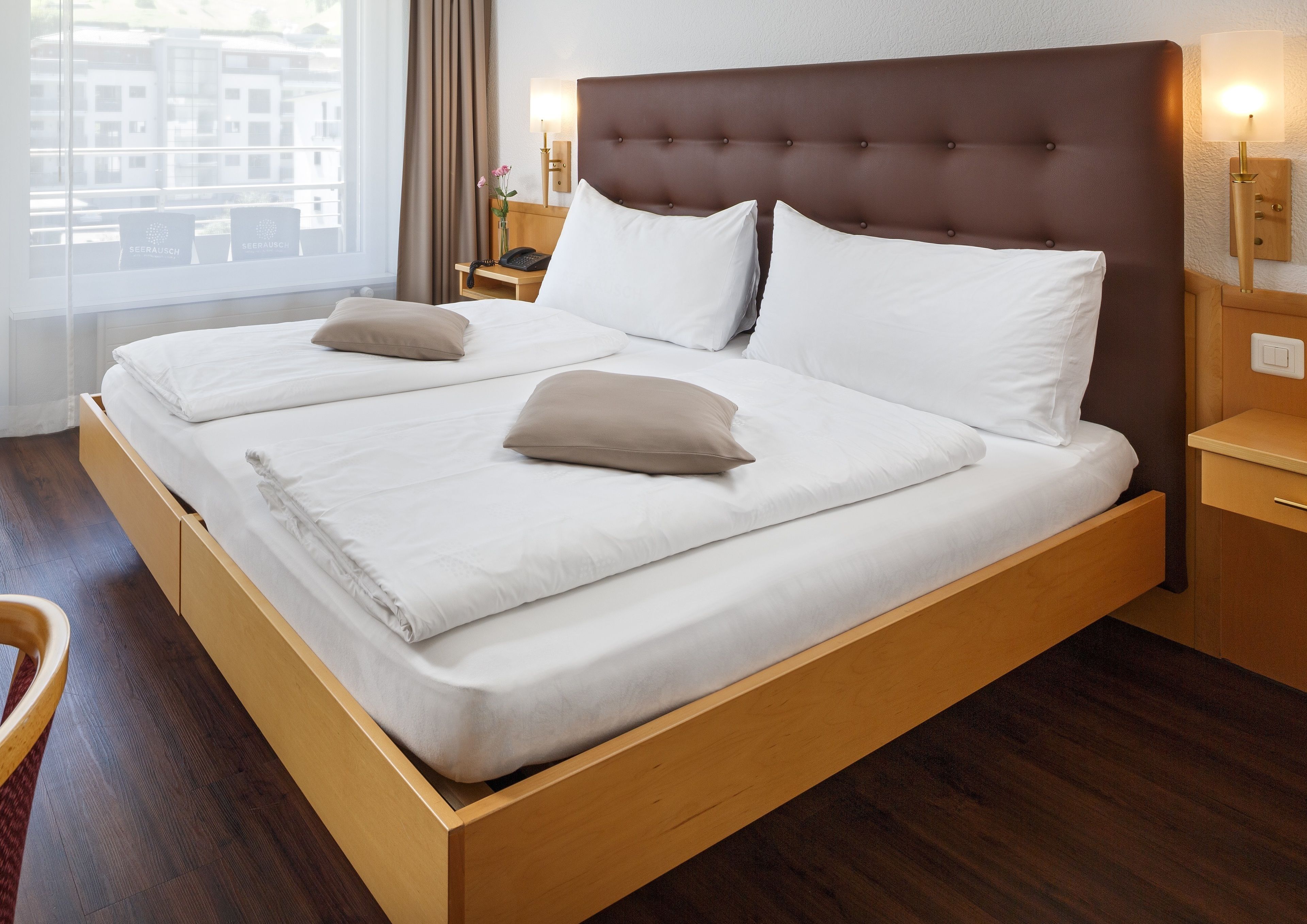 panoramic twin room, balcony, mountain view | in-room safe, iron/ironing board, bed sheets