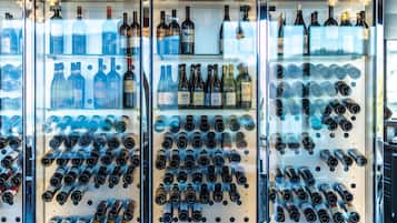 A wine display with various bottles and wine glasses.