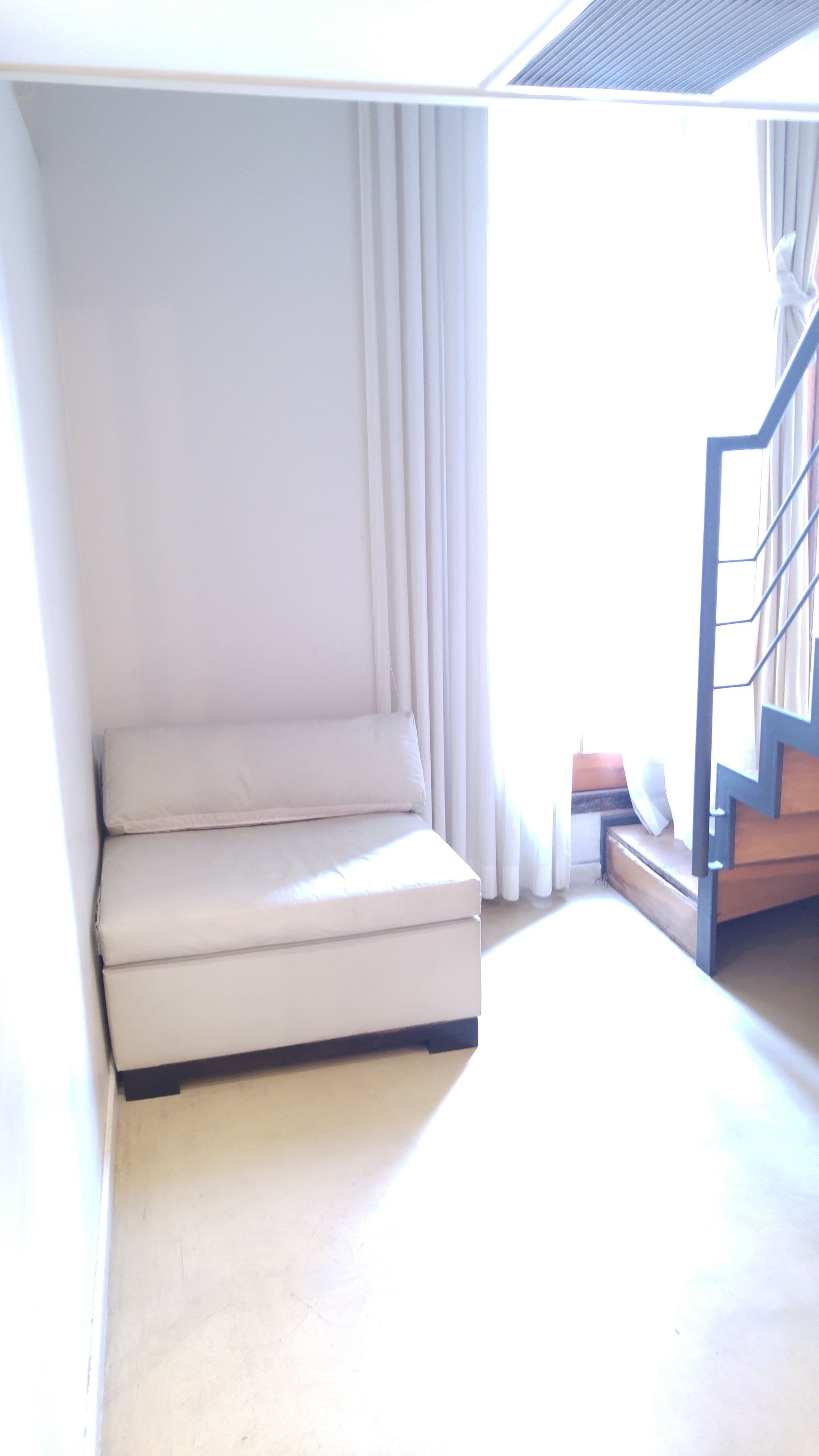 single room | living area | flat-screen tv