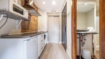 Superior Studio, Kitchenette | Private kitchen | Fridge, microwave, stovetop, coffee/tea maker