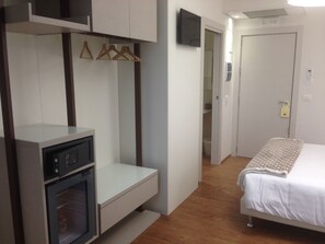 Familiekamer | Luxe beddengoed, Select Comfort-bedden, een minibar