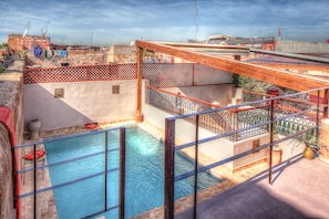 Indoor pool, outdoor pool, pool umbrellas, sun loungers
