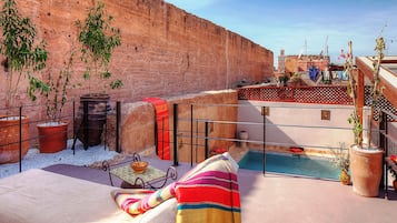 Indoor pool, outdoor pool, pool umbrellas, sun loungers