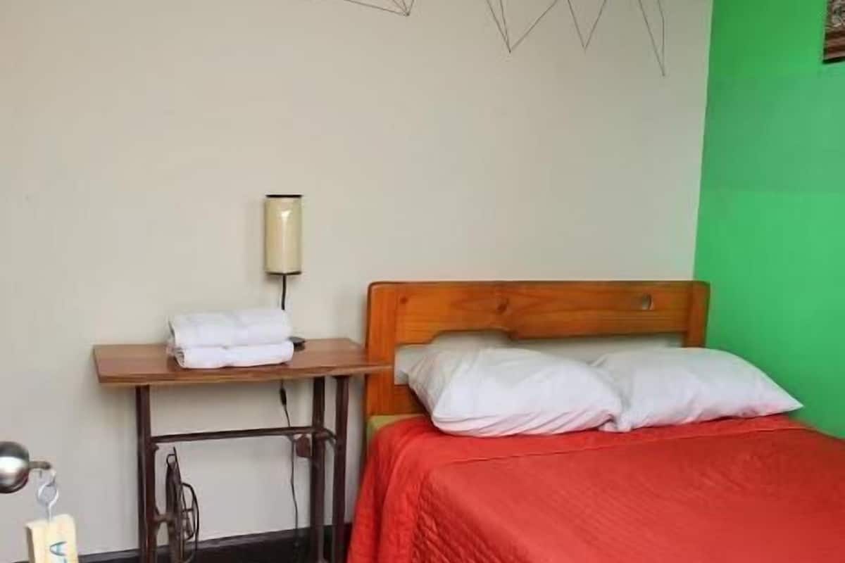Laptop workspace, free WiFi, bed sheets