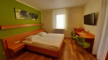 Premium bedding, pillow-top beds, in-room safe, desk