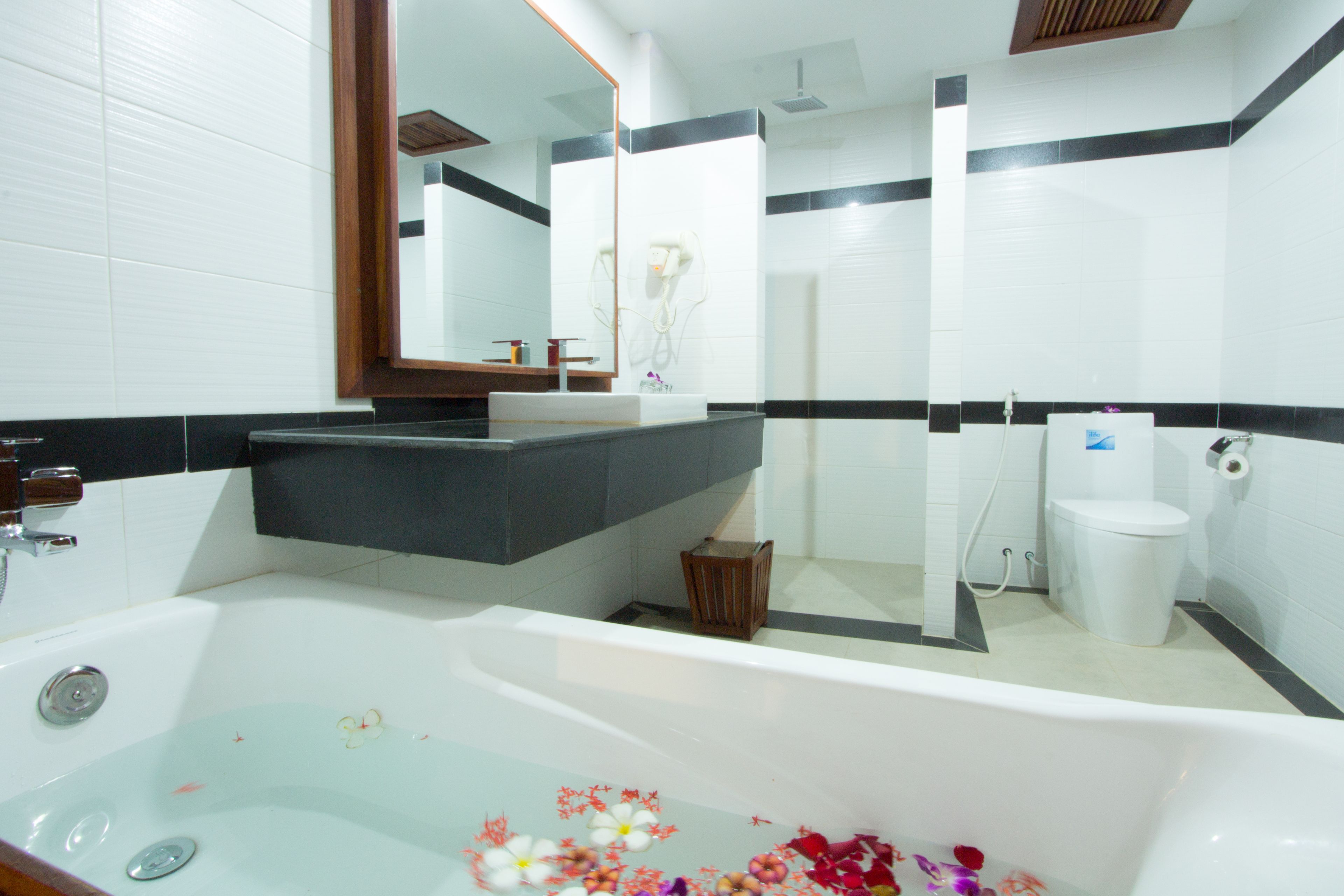 separate bathtub and shower, deep-soaking bathtub, free toiletries