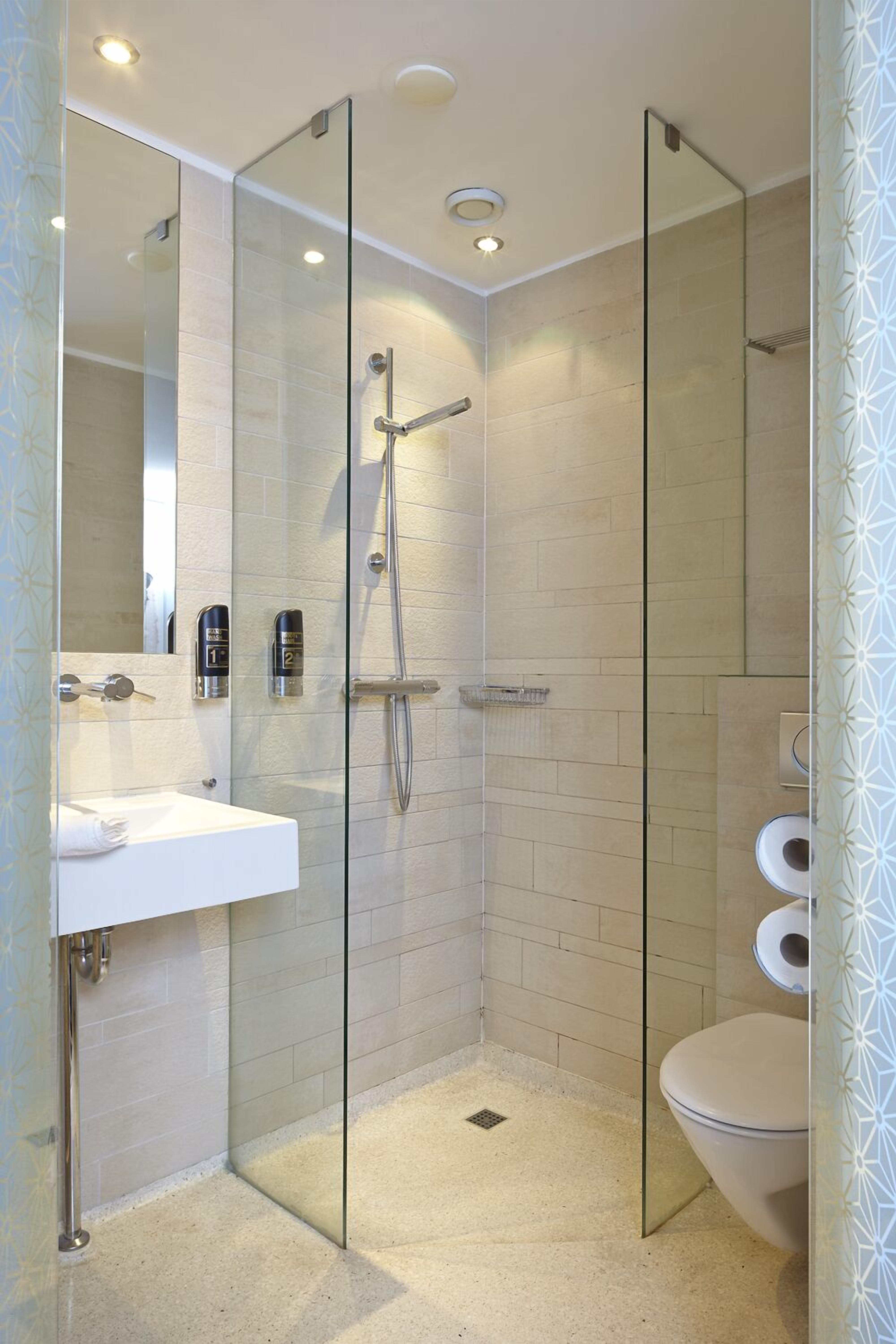 free toiletries, hair dryer, towels, shampoo