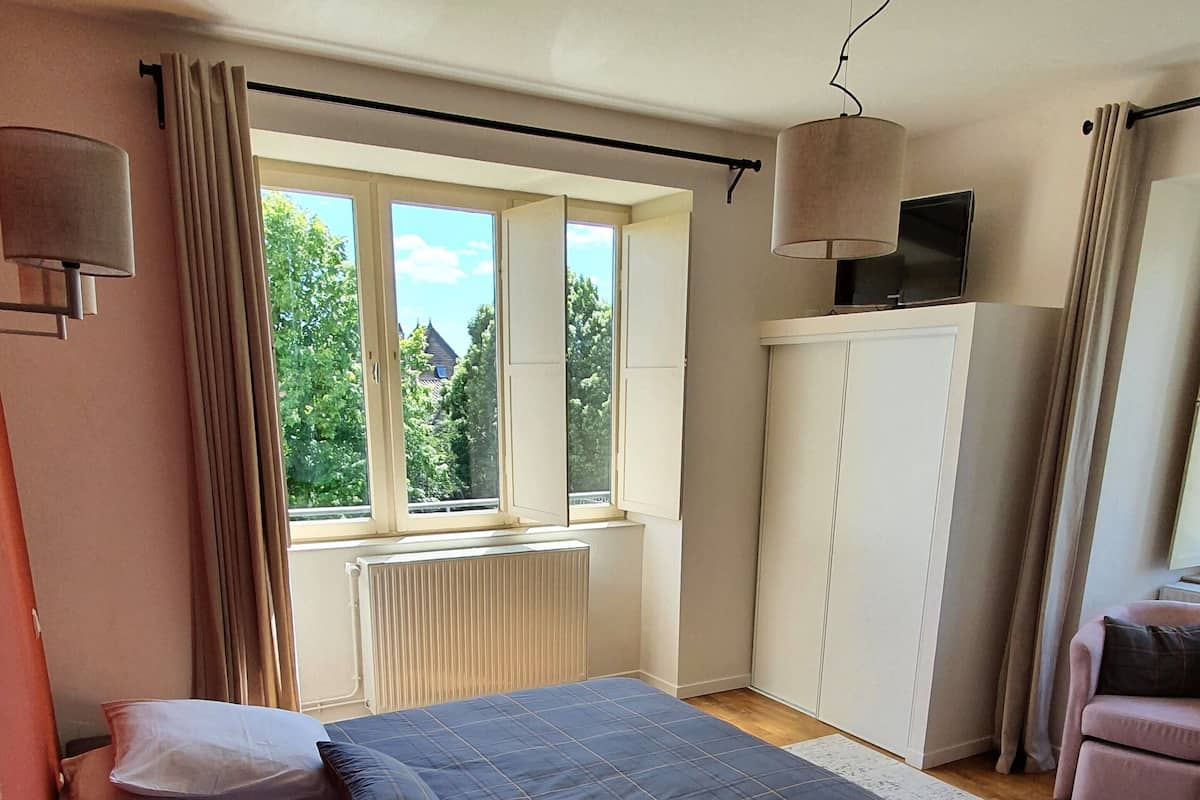 Habitación Confort (L'Astucieuse) | Ropa de cama de alta calidad y minibar