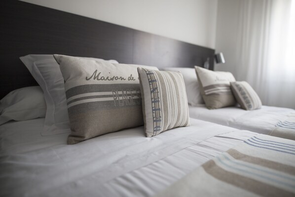 Down duvets, memory-foam beds, minibar, in-room safe