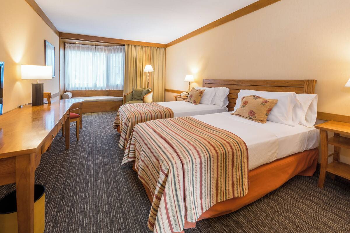 superior triple room, lake view | 1 bedroom, in-room safe, desk, soundproofing