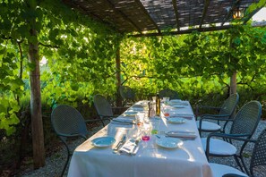 Lunch, dinner served; Italian cuisine, garden views