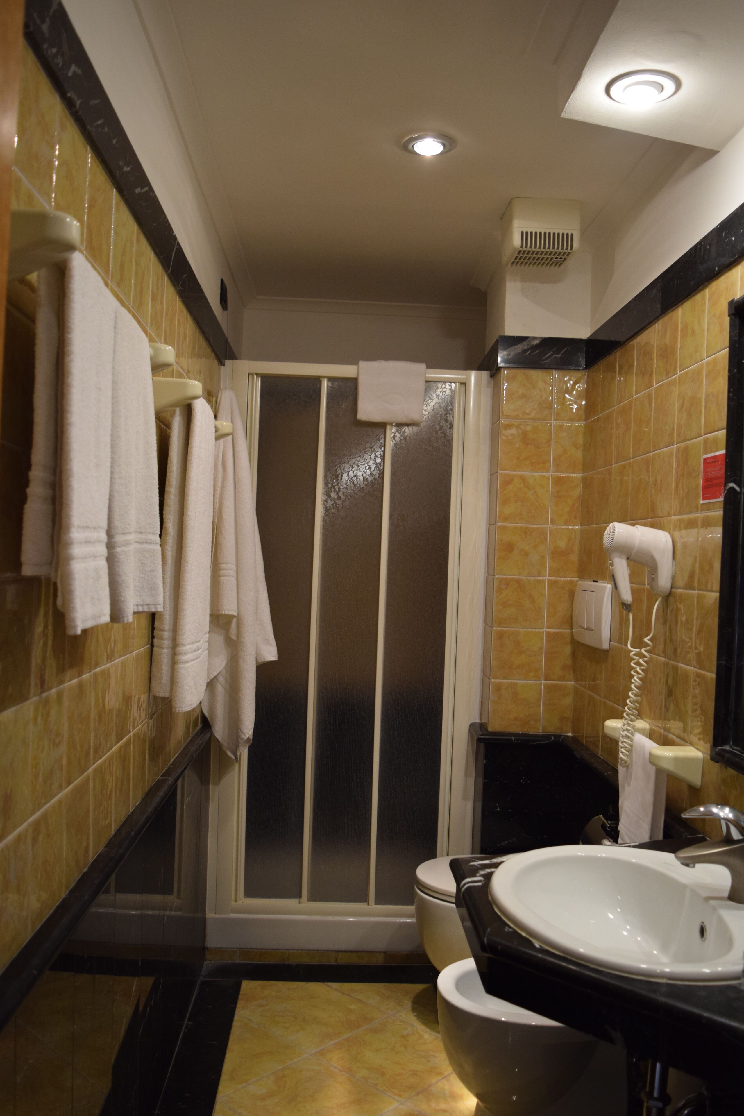 standard double or twin room | bathroom | combined shower/bathtub, free toiletries, hair dryer, slippers