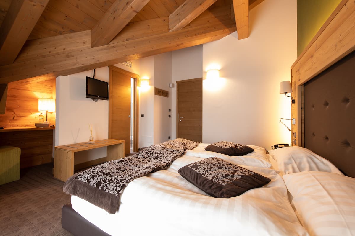 Camera Mansardata con balcone | Minibar, in-room safe, desk, soundproofing