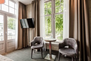 Suíte | Roupas de cama premium, frigobar, individualmente decorados