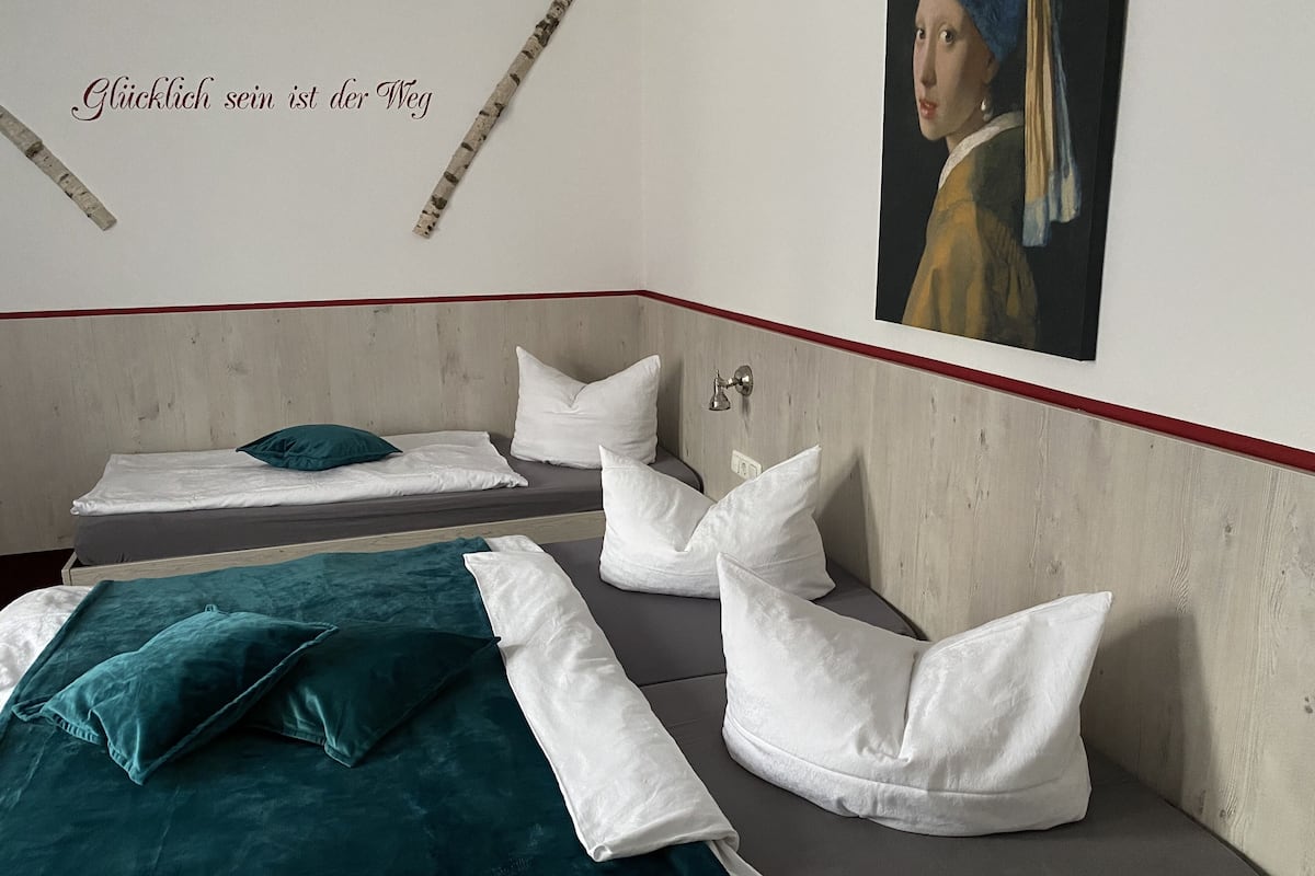 triple room | hypo-allergenic bedding, blackout curtains, free cots/infant beds