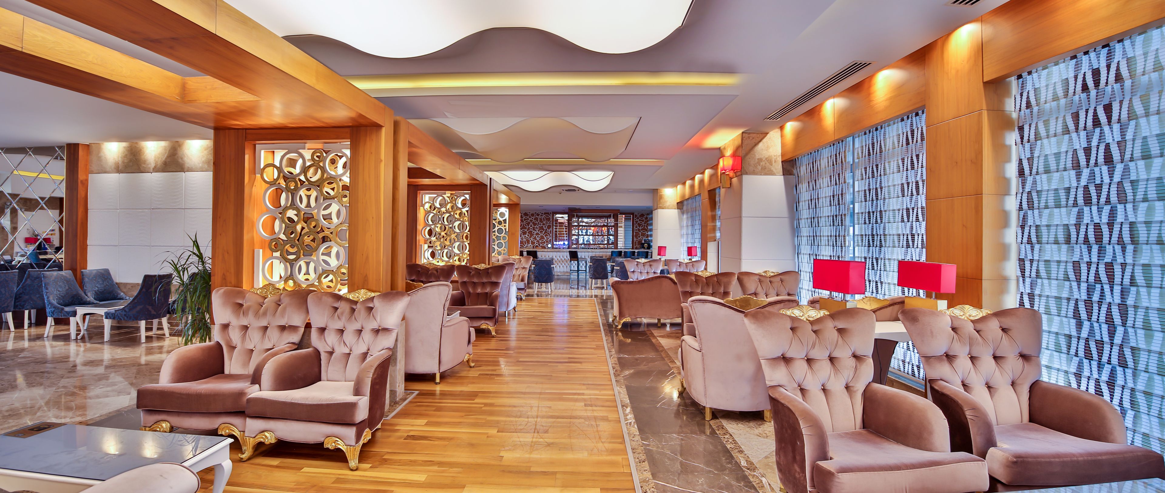 A spacious lobby with plush seating and a modern design.